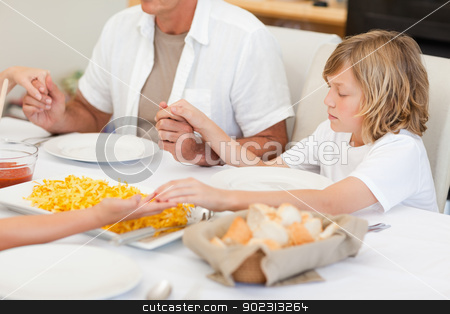 To use this stock image in your creative project, please select the size you need over to the right and click the "Add to Cart" button.
Your downloaded image will come with the Cutcaster watermark removed so don’t worry about the watermark you see on this page. Family saying a prayer before dinner stock photo, Family saying a prayer together before dinner by Wavebreak Media