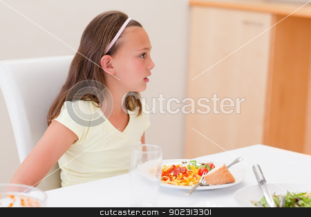 To use this stock image in your creative project, please select the size you need over to the right and click the "Add to Cart" button.
Your downloaded image will come with the Cutcaster watermark removed so don’t worry about the watermark you see on this page. Girl with dinner at the table stock photo, Girl with her dinner at the table by Wavebreak Media