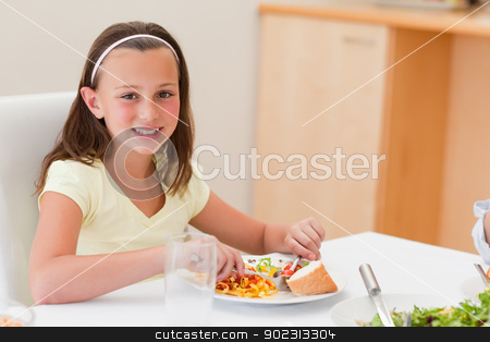 To use this stock image in your creative project, please select the size you need over to the right and click the "Add to Cart" button.
Your downloaded image will come with the Cutcaster watermark removed so don’t worry about the watermark you see on this page. Smiling girl having dinner at dinner table stock photo, Smiling girl having dinner at the dinner table by Wavebreak Media