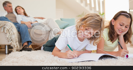 To use this stock image in your creative project, please select the size you need over to the right and click the "Add to Cart" button.
Your downloaded image will come with the Cutcaster watermark removed so don’t worry about the watermark you see on this page. Siblings doing their homework on the carpet with parents behind stock photo, Siblings doing their homework on the carpet with their parents behind them by Wavebreak Media