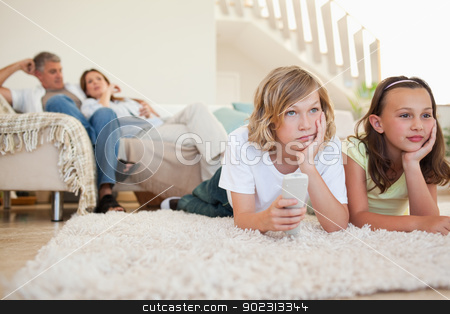 To use this stock image in your creative project, please select the size you need over to the right and click the "Add to Cart" button.
Your downloaded image will come with the Cutcaster watermark removed so don’t worry about the watermark you see on this page. Siblings bored by tv program stock photo, Siblings are bored by tv program by Wavebreak Media
