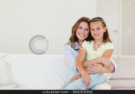 To use this stock image in your creative project, please select the size you need over to the right and click the "Add to Cart" button.
Your downloaded image will come with the Cutcaster watermark removed so don’t worry about the watermark you see on this page. Smiling mother and daughter embracing stock photo, Happy smiling mother and daughter embracing by Wavebreak Media