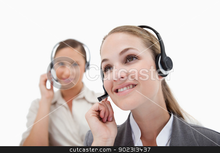 To use this stock image in your creative project, please select the size you need over to the right and click the "Add to Cart" button.
Your downloaded image will come with the Cutcaster watermark removed so don’t worry about the watermark you see on this page. Smiling operators using headsets stock photo, Smiling operators using headsets against a white background by Wavebreak Media