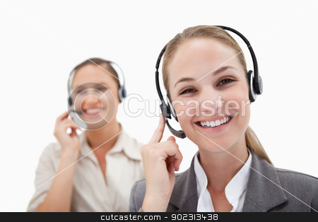 To use this stock image in your creative project, please select the size you need over to the right and click the "Add to Cart" button.
Your downloaded image will come with the Cutcaster watermark removed so don’t worry about the watermark you see on this page. Happy operators using headsets stock photo, Happy operators using headsets against a white background by Wavebreak Media