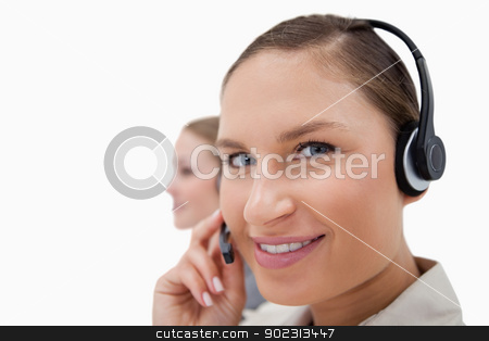 To use this stock image in your creative project, please select the size you need over to the right and click the "Add to Cart" button.
Your downloaded image will come with the Cutcaster watermark removed so don’t worry about the watermark you see on this page. Young sales persons using headsets stock photo, Young sales persons using headsets against a white background by Wavebreak Media