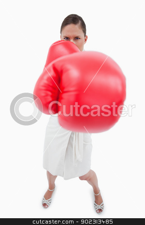 To use this stock image in your creative project, please select the size you need over to the right and click the "Add to Cart" button.
Your downloaded image will come with the Cutcaster watermark removed so don’t worry about the watermark you see on this page. Portrait of an angry boxing businesswoman stock photo, Portrait of an angry boxing businesswoman against a white background by Wavebreak Media