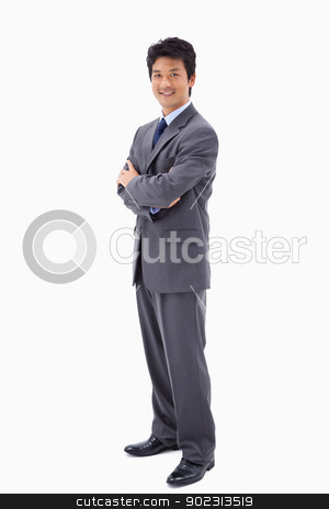 To use this stock image in your creative project, please select the size you need over to the right and click the "Add to Cart" button.
Your downloaded image will come with the Cutcaster watermark removed so don’t worry about the watermark you see on this page. Portrait of a smiling businessman with the arms crossed stock photo, Portrait of a smiling businessman with the arms crossed against a white background by Wavebreak Media