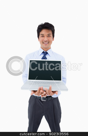 To use this stock image in your creative project, please select the size you need over to the right and click the "Add to Cart" button.
Your downloaded image will come with the Cutcaster watermark removed so don’t worry about the watermark you see on this page. Portrait of a businessman showing a notebook stock photo, Portrait of a businessman showing a notebook against a white background by Wavebreak Media