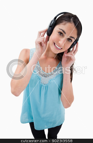 To use this stock image in your creative project, please select the size you need over to the right and click the "Add to Cart" button.
Your downloaded image will come with the Cutcaster watermark removed so don’t worry about the watermark you see on this page. Portrait of a woman listening to music stock photo, Portrait of a woman listening to music against a white background by Wavebreak Media