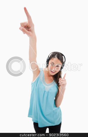 To use this stock image in your creative project, please select the size you need over to the right and click the "Add to Cart" button.
Your downloaded image will come with the Cutcaster watermark removed so don’t worry about the watermark you see on this page. Portrait of a woman dancing while listening to music stock photo, Portrait of a woman dancing while listening to music against a white background by Wavebreak Media