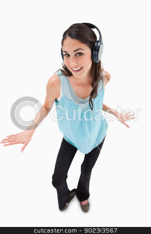To use this stock image in your creative project, please select the size you need over to the right and click the "Add to Cart" button.
Your downloaded image will come with the Cutcaster watermark removed so don’t worry about the watermark you see on this page. Portrait of a cheerful woman dancing while listening to music stock photo, Portrait of a cheerful woman dancing while listening to music against a white background by Wavebreak Media