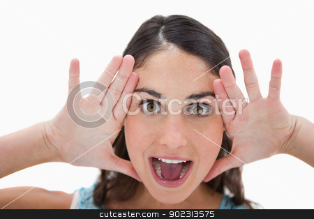 To use this stock image in your creative project, please select the size you need over to the right and click the "Add to Cart" button.
Your downloaded image will come with the Cutcaster watermark removed so don’t worry about the watermark you see on this page. Excited woman shouting stock photo, Excited woman shouting against a white background by Wavebreak Media