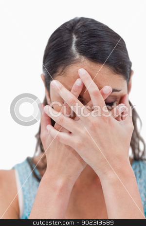 To use this stock image in your creative project, please select the size you need over to the right and click the "Add to Cart" button.
Your downloaded image will come with the Cutcaster watermark removed so don’t worry about the watermark you see on this page. Portrait of a woman hiding her face stock photo, Portrait of a woman hiding her face against a white background by Wavebreak Media