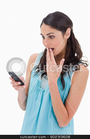 To use this stock image in your creative project, please select the size you need over to the right and click the "Add to Cart" button.
Your downloaded image will come with the Cutcaster watermark removed so don’t worry about the watermark you see on this page. Portrait of a surprised woman reading a text message stock photo, Portrait of a surprised woman reading a text message against a white background by Wavebreak Media