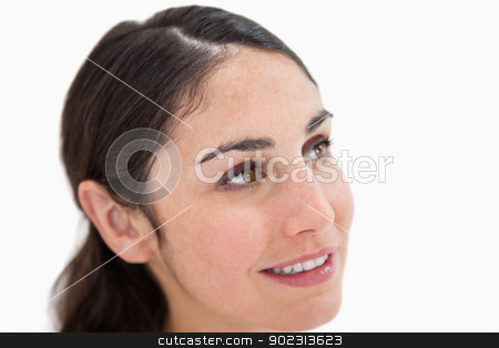 To use this stock image in your creative project, please select the size you need over to the right and click the "Add to Cart" button.
Your downloaded image will come with the Cutcaster watermark removed so don’t worry about the watermark you see on this page. Close up of a young woman looking away from the camera stock photo, Close up of a young woman looking away from the camera against a white background by Wavebreak Media