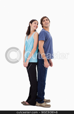 To use this stock image in your creative project, please select the size you need over to the right and click the "Add to Cart" button.
Your downloaded image will come with the Cutcaster watermark removed so don’t worry about the watermark you see on this page. Portrait of a smiling couple standing back to back stock photo, Portrait of a smiling couple standing back to back against a white background by Wavebreak Media