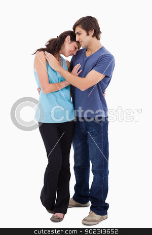 To use this stock image in your creative project, please select the size you need over to the right and click the "Add to Cart" button.
Your downloaded image will come with the Cutcaster watermark removed so don’t worry about the watermark you see on this page. Portrait of a lovely couple embracing each other stock photo, Portrait of a lovely couple embracing each other against a white background by Wavebreak Media