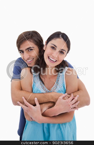 To use this stock image in your creative project, please select the size you need over to the right and click the "Add to Cart" button.
Your downloaded image will come with the Cutcaster watermark removed so don’t worry about the watermark you see on this page. Portrait of a charming couple embracing each other stock photo, Portrait of a charming couple embracing each other against a white background by Wavebreak Media