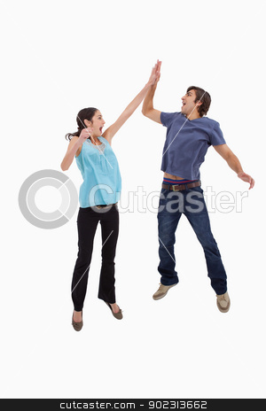 To use this stock image in your creative project, please select the size you need over to the right and click the "Add to Cart" button.
Your downloaded image will come with the Cutcaster watermark removed so don’t worry about the watermark you see on this page. Portrait of a couple jumping together stock photo, Portrait of a couple jumping together against a white background by Wavebreak Media