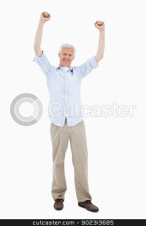 To use this stock image in your creative project, please select the size you need over to the right and click the "Add to Cart" button.
Your downloaded image will come with the Cutcaster watermark removed so don’t worry about the watermark you see on this page. Portrait of a mature man with the arms up stock photo, Portrait of a mature man with the arms up against a white background by Wavebreak Media