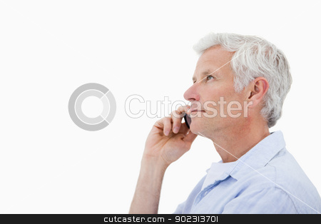 To use this stock image in your creative project, please select the size you need over to the right and click the "Add to Cart" button.
Your downloaded image will come with the Cutcaster watermark removed so don’t worry about the watermark you see on this page. Side view of a man making a phone call stock photo, Side view of a man making a phone call against a white background by Wavebreak Media