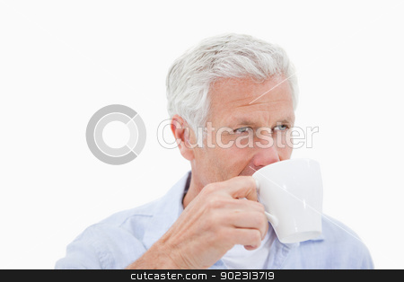 To use this stock image in your creative project, please select the size you need over to the right and click the "Add to Cart" button.
Your downloaded image will come with the Cutcaster watermark removed so don’t worry about the watermark you see on this page. Mature man drinking coffee stock photo, Mature man drinking coffee against a white background by Wavebreak Media
