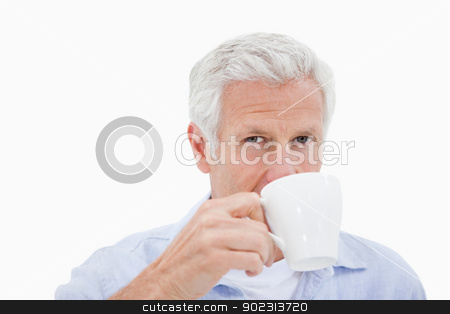 To use this stock image in your creative project, please select the size you need over to the right and click the "Add to Cart" button.
Your downloaded image will come with the Cutcaster watermark removed so don’t worry about the watermark you see on this page. Mature man drinking tea stock photo, Mature man drinking tea against a white background by Wavebreak Media