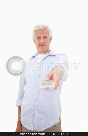 To use this stock image in your creative project, please select the size you need over to the right and click the "Add to Cart" button.
Your downloaded image will come with the Cutcaster watermark removed so don’t worry about the watermark you see on this page. Portrait of a mature man switching of channel stock photo, Portrait of a mature man switching of channel against a white background by Wavebreak Media
