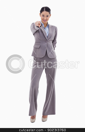 To use this stock image in your creative project, please select the size you need over to the right and click the "Add to Cart" button.
Your downloaded image will come with the Cutcaster watermark removed so don’t worry about the watermark you see on this page. Portrait of a young brunette businesswoman pointing at the viewe stock photo, Portrait of a young brunette businesswoman pointing at the viewer against a white background by Wavebreak Media