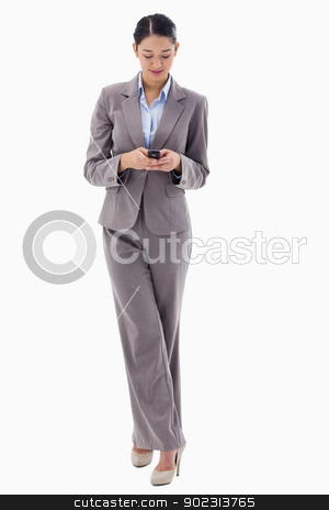 To use this stock image in your creative project, please select the size you need over to the right and click the "Add to Cart" button.
Your downloaded image will come with the Cutcaster watermark removed so don’t worry about the watermark you see on this page. Portrait of a brunette businesswoman sending a text message stock photo, Portrait of a brunette businesswoman sending a text message against a white background by Wavebreak Media