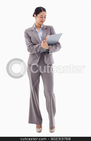 To use this stock image in your creative project, please select the size you need over to the right and click the "Add to Cart" button.
Your downloaded image will come with the Cutcaster watermark removed so don’t worry about the watermark you see on this page. Portrait of a smiling businesswoman taking notes stock photo, Portrait of a smiling businesswoman taking notes against a white background by Wavebreak Media
