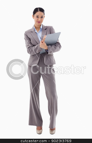 To use this stock image in your creative project, please select the size you need over to the right and click the "Add to Cart" button.
Your downloaded image will come with the Cutcaster watermark removed so don’t worry about the watermark you see on this page. Portrait of a brunette businesswoman taking notes stock photo, Portrait of a brunette businesswoman taking notes against a white background by Wavebreak Media