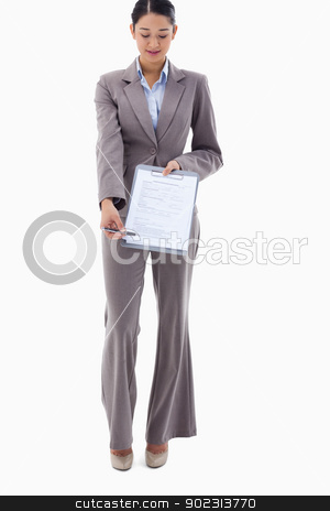 To use this stock image in your creative project, please select the size you need over to the right and click the "Add to Cart" button.
Your downloaded image will come with the Cutcaster watermark removed so don’t worry about the watermark you see on this page. Portrait of a businesswoman showing a contract stock photo, Portrait of a businesswoman showing a contract against a white background by Wavebreak Media