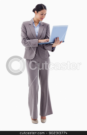 To use this stock image in your creative project, please select the size you need over to the right and click the "Add to Cart" button.
Your downloaded image will come with the Cutcaster watermark removed so don’t worry about the watermark you see on this page. Portrait of a businesswoman using a laptop stock photo, Portrait of a businesswoman using a laptop against a white background by Wavebreak Media