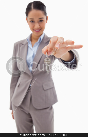 To use this stock image in your creative project, please select the size you need over to the right and click the "Add to Cart" button.
Your downloaded image will come with the Cutcaster watermark removed so don’t worry about the watermark you see on this page. Portrait of a smiling businesswoman holding a key stock photo, Portrait of a smiling businesswoman holding a key against a white background by Wavebreak Media