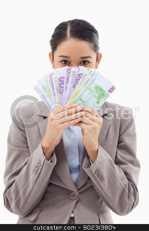 To use this stock image in your creative project, please select the size you need over to the right and click the "Add to Cart" button.
Your downloaded image will come with the Cutcaster watermark removed so don’t worry about the watermark you see on this page. Portrait of a greedy businesswoman holding bank notes stock photo, Portrait of a greedy businesswoman holding bank notes against a white background by Wavebreak Media