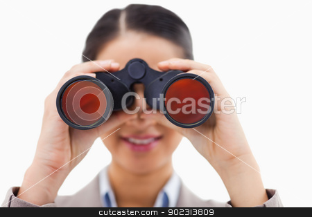 To use this stock image in your creative project, please select the size you need over to the right and click the "Add to Cart" button.
Your downloaded image will come with the Cutcaster watermark removed so don’t worry about the watermark you see on this page. Close up of a businesswoman looking through binoculars stock photo, Close up of a businesswoman looking through binoculars against a white background by Wavebreak Media