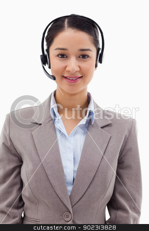 To use this stock image in your creative project, please select the size you need over to the right and click the "Add to Cart" button.
Your downloaded image will come with the Cutcaster watermark removed so don’t worry about the watermark you see on this page. Portrait of a smiling operator posing with a headset stock photo, Portrait of a smiling operator posing with a headset against a white background by Wavebreak Media