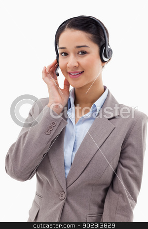 To use this stock image in your creative project, please select the size you need over to the right and click the "Add to Cart" button.
Your downloaded image will come with the Cutcaster watermark removed so don’t worry about the watermark you see on this page. Portrait of a good looking operator posing with a headset stock photo, Portrait of a good looking operator posing with a headset against a white background by Wavebreak Media