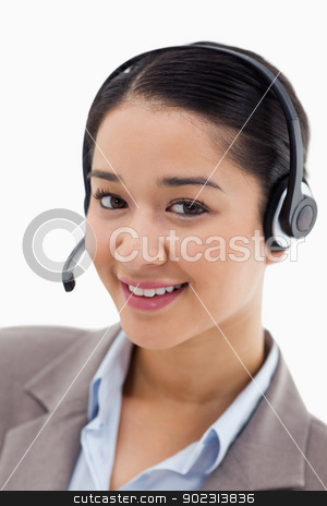 To use this stock image in your creative project, please select the size you need over to the right and click the "Add to Cart" button.
Your downloaded image will come with the Cutcaster watermark removed so don’t worry about the watermark you see on this page. Portrait of a happy office worker posing with a headset stock photo, Portrait of a happy office worker posing with a headset against a white background by Wavebreak Media