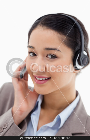To use this stock image in your creative project, please select the size you need over to the right and click the "Add to Cart" button.
Your downloaded image will come with the Cutcaster watermark removed so don’t worry about the watermark you see on this page. Portrait of a beautiful office worker posing with a headset stock photo, Portrait of a beautiful office worker posing with a headset against a white background by Wavebreak Media