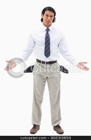 To use this stock image in your creative project, please select the size you need over to the right and click the "Add to Cart" button.
Your downloaded image will come with the Cutcaster watermark removed so don’t worry about the watermark you see on this page. Portrait of an innocent businessman showing his empty pockets stock photo, Portrait of an innocent businessman showing his empty pockets against a white background by Wavebreak Media