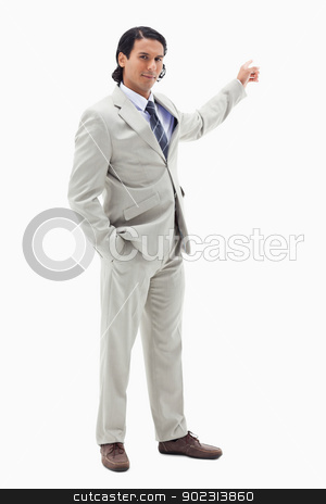 To use this stock image in your creative project, please select the size you need over to the right and click the "Add to Cart" button.
Your downloaded image will come with the Cutcaster watermark removed so don’t worry about the watermark you see on this page. Portrait of a handsome businessman pointing at a copy space stock photo, Portrait of a handsome businessman pointing at a copy space against a white background by Wavebreak Media