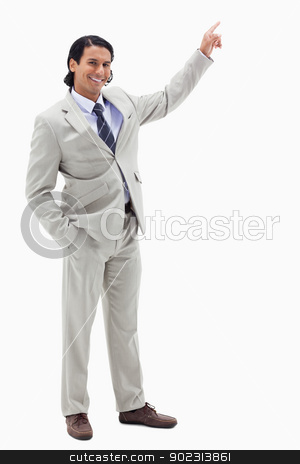 To use this stock image in your creative project, please select the size you need over to the right and click the "Add to Cart" button.
Your downloaded image will come with the Cutcaster watermark removed so don’t worry about the watermark you see on this page. Portrait of a smiling businessman pointing at a copy space stock photo, Portrait of a smiling businessman pointing at a copy space against a white background by Wavebreak Media