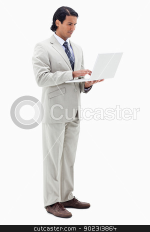 To use this stock image in your creative project, please select the size you need over to the right and click the "Add to Cart" button.
Your downloaded image will come with the Cutcaster watermark removed so don’t worry about the watermark you see on this page. Portrait of a businessman using a notebook stock photo, Portrait of a businessman using a notebook against a white background by Wavebreak Media