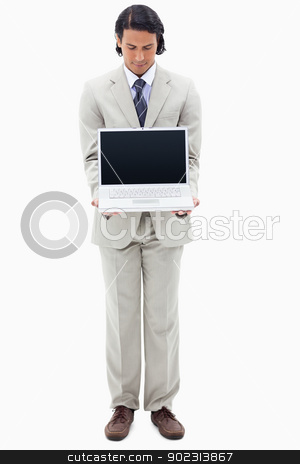 To use this stock image in your creative project, please select the size you need over to the right and click the "Add to Cart" button.
Your downloaded image will come with the Cutcaster watermark removed so don’t worry about the watermark you see on this page. Portrait of a young businessman showing a notebook stock photo, Portrait of a young businessman showing a notebook against a white background by Wavebreak Media