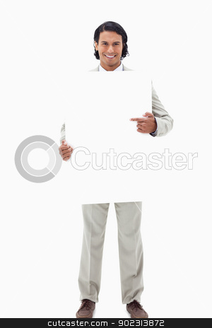 To use this stock image in your creative project, please select the size you need over to the right and click the "Add to Cart" button.
Your downloaded image will come with the Cutcaster watermark removed so don’t worry about the watermark you see on this page. Businessman pointing at blank sign in his hands stock photo, Businessman pointing at blank sign in his hands against a white background by Wavebreak Media