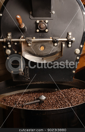 To use this stock image in your creative project, please select the size you need over to the right and click the "Add to Cart" button.
Your downloaded image will come with the Cutcaster watermark removed so don’t worry about the watermark you see on this page. Roaster cooling coffee beans stock photo, The freshly roasted coffee beans from a large old coffee roaster being stirred in the cooling cylinder. by © Ron Sumners