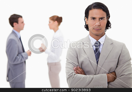 To use this stock image in your creative project, please select the size you need over to the right and click the "Add to Cart" button.
Your downloaded image will come with the Cutcaster watermark removed so don’t worry about the watermark you see on this page. Serious businessman with talking colleagues behind him stock photo, Serious businessman with talking colleagues behind him against a white background by Wavebreak Media