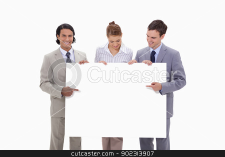 To use this stock image in your creative project, please select the size you need over to the right and click the "Add to Cart" button.
Your downloaded image will come with the Cutcaster watermark removed so don’t worry about the watermark you see on this page. Businessteam pointing at blank sign in their hands stock photo, Businessteam pointing at blank sign in their hands against a white background by Wavebreak Media